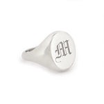 Minimalist gold initial signet ring for women with personalized alphabet detail and dainty finish
