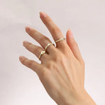 featuring a diamond sunburst. A perfect minimal jewelry piece for effortless elegance.