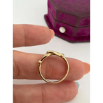Classic lab grown diamond solitaire ring with round brilliant cut stone in gold band