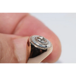 Elegant lab created gemstone ring with garnet red stone and sparkling diamond setting