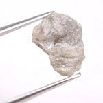 Natural gray diamond ring featuring salt and pepper inclusions and minimalist design