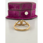 Classic lab grown diamond solitaire ring with round brilliant cut stone in gold band