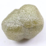 raw natural diamond crystal showing natural rough diamond texture yellow grey rough diamond