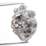 Salt and pepper diamond ring showcasing raw gray diamond texture and unique inclusions