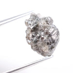 Salt and pepper diamond ring showcasing raw gray diamond texture and unique inclusions