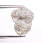 Natural gray diamond ring featuring salt and pepper inclusions and minimalist design