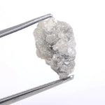 Natural gray diamond ring featuring salt and pepper inclusions and minimalist design