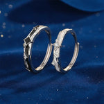 Matching gold and silver couple rings, versatile design for everyday wear.