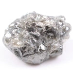 Salt and pepper diamond ring showcasing raw gray diamond texture and unique inclusions