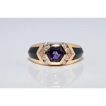 Modern lab created gemstone ring with aquamarine center and brilliant white diamonds