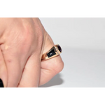 Modern lab created gemstone ring with aquamarine center and brilliant white diamonds