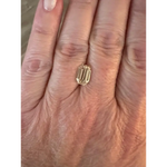 Shop a 3.07 Ct champagne yellow lab grown diamond featuring a modified octagon step cut. This elegant geometric stone offers a refined look, perfect for custom engagement rings and luxury jewelry designs.