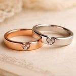 Rose gold couple rings with engraved infinity symbols, eternal love gift.