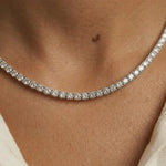 beautiful necklace gold with gold flower necklace detailing and sparkling feminine jewelry design.