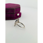 Elegant lab grown diamond ring featuring brilliant cut stone set in classic gold band design
