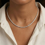 beautiful necklace gold with gold flower necklace detailing and sparkling feminine jewelry design.