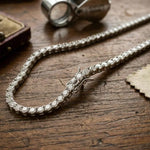 beautiful necklace gold with gold flower necklace detailing and sparkling feminine jewelry design.