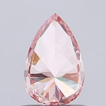 vivid pink colour pear cut pink lab grown diamond with brilliant facets on a light gray background.