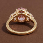 3 stone oval engagement ring with elegant diamond setting