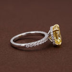 yellow oval cut diamond ring with lab grown diamond