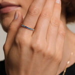 Glamorous gemstone ring with radiant cut stone and halo setting for luxury jewelry look