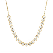 0.49 Ct gold pendant necklace with delicate chain and charm.