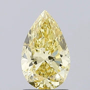 intense yellow colour diamond pear fancy intense yellow lab grown diamond si1 light grey background