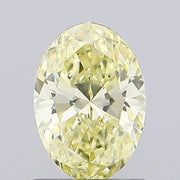 fancy yellow colour diamond oval cut fancy yellow lab grown diamond light grey background