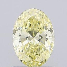 fancy yellow colour diamond oval cut fancy yellow lab grown diamond light grey background
