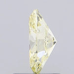 fancy yellow colour diamond oval cut fancy yellow lab grown diamond light grey background