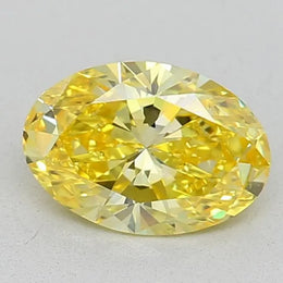 0.81 Ct fancy vivid yellow oval cut lab grown diamond with bright color and brilliant sparkle for engagement rings