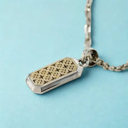 Gold pendant for men designed with modern pendant necklace and luxury pendant detailing.