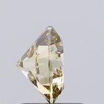 light brownish yellow colour diamond round brilliant light brownish yellow lab diamond light grey background