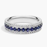 lab-created ruby-pink oval cut gemstone ring, adorned with sparkling white accent stones
