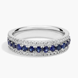 lab-created ruby-pink oval cut gemstone ring, adorned with sparkling white accent stones