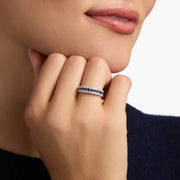 lab-created ruby-pink oval cut gemstone ring, adorned with sparkling white accent stones