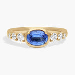 Elegant gemstone ring with sparkling center stone set in polished band, perfect for daily wear
