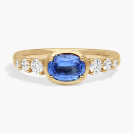 Elegant gemstone ring with sparkling center stone set in polished band, perfect for daily wear
