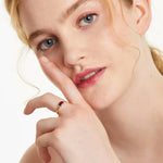 Designer gemstone ring featuring colorful stone with modern band for stylish appearance