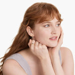 Classic gemstone ring with vibrant stone and delicate band design for timeless elegance
