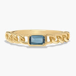 Classic gemstone ring with vibrant stone and delicate band design for timeless elegance