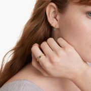 Classic gemstone ring with vibrant stone and delicate band design for timeless elegance