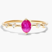 Luxury gemstone ring featuring vibrant colored stone with brilliant shine and classic design