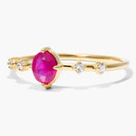 Luxury gemstone ring featuring vibrant colored stone with brilliant shine and classic design