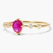 Luxury gemstone ring featuring vibrant colored stone with brilliant shine and classic design