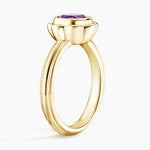 Elegant gemstone ring with vibrant center stone and sparkling accents, crafted for timeless beauty and modern style