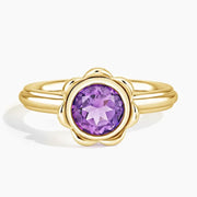 Elegant gemstone ring with vibrant center stone and sparkling accents, crafted for timeless beauty and modern style