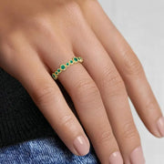 Vintage inspired gemstone ring with intricate design and sparkling center gemstone