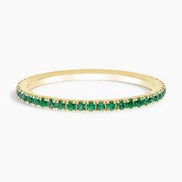 Delicate gemstone ring with pear shaped stone and thin band for feminine jewelry style