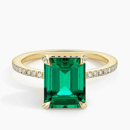 Glamorous gemstone ring with radiant cut stone and halo setting for luxury jewelry look